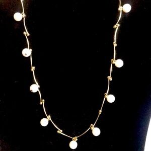 Silver tone and faux pearl necklace